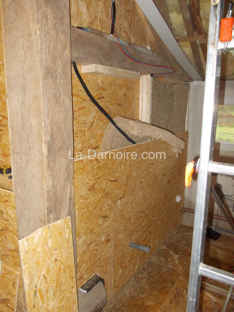 Hemp insulation being installed