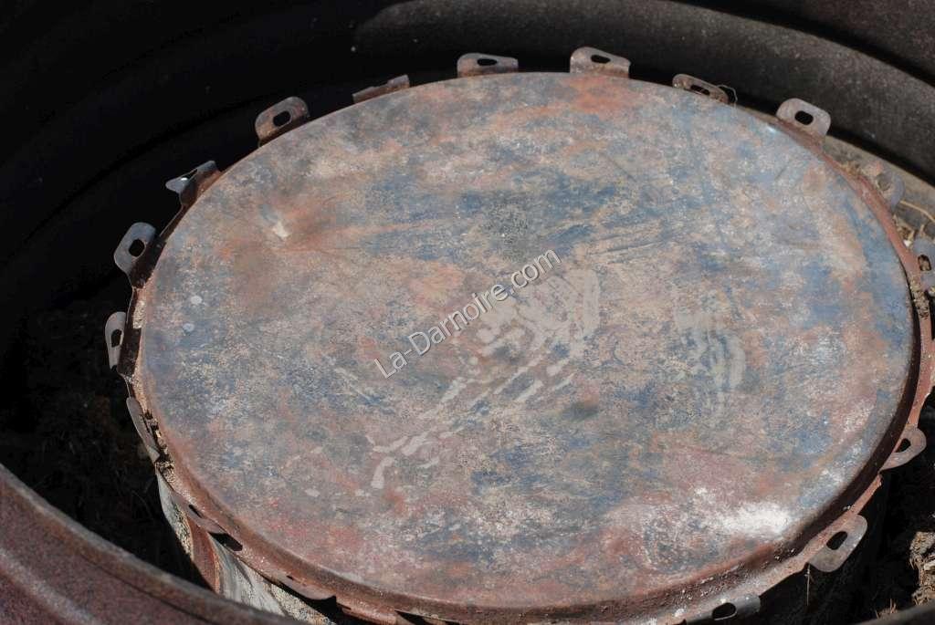 The charcoal retort; a smaller drum with a lid